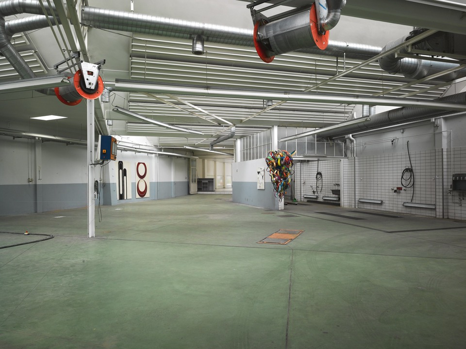 Before: 'New Generation' exhibition inside the remainings of the garage, before construction started